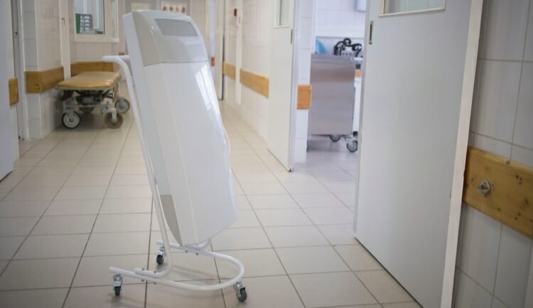 portable air purifier in hospital hallway